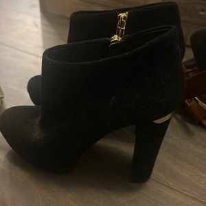 Never worn Michael Kors booties !